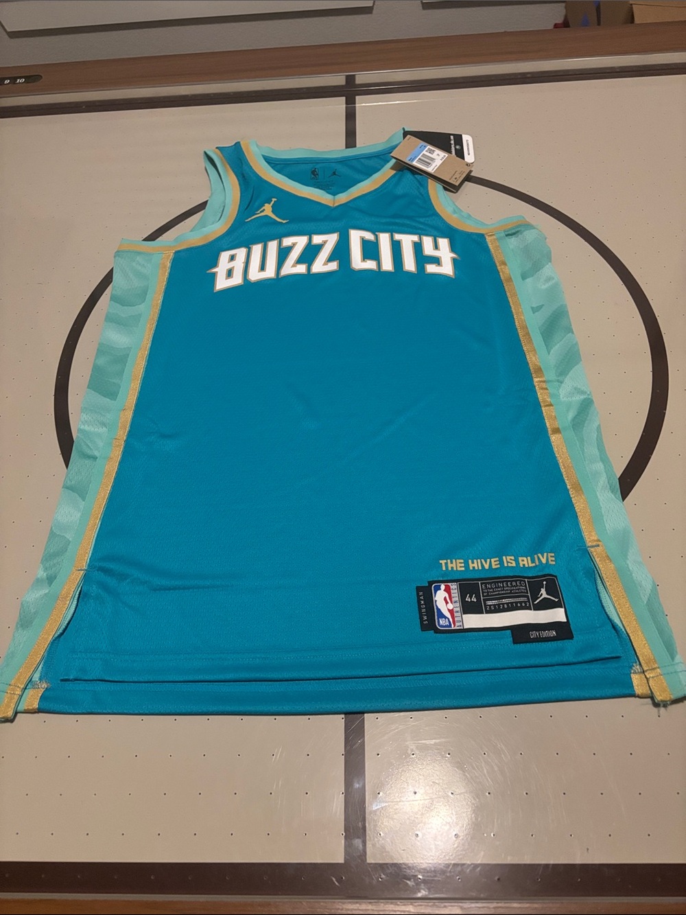 Jordan Buzz City Teal and Gold Men’s Jersey